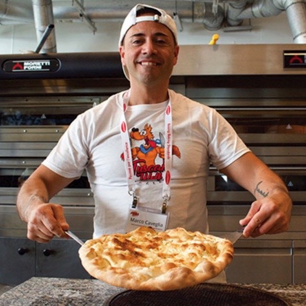 Marco Caveglia of Tuscan Wolf Pizzeria in Whitby, Ont., made a pizza using a double dough filled with stracchino cheese. The pizza was awarded second place in the 2018 Canada wide pizza competition.